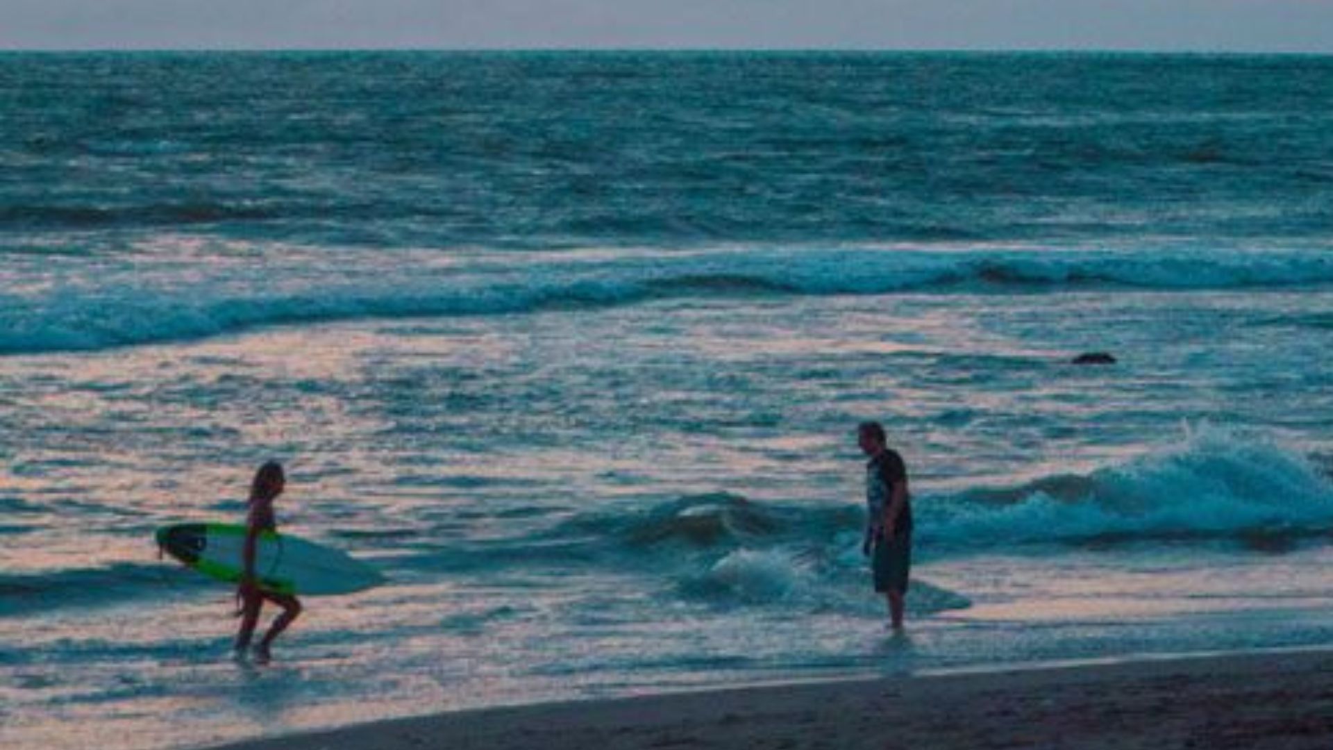 SURFING AT BERAWA BEACH